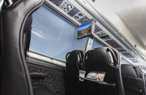 Inside luxury coach Via Adventures bus.